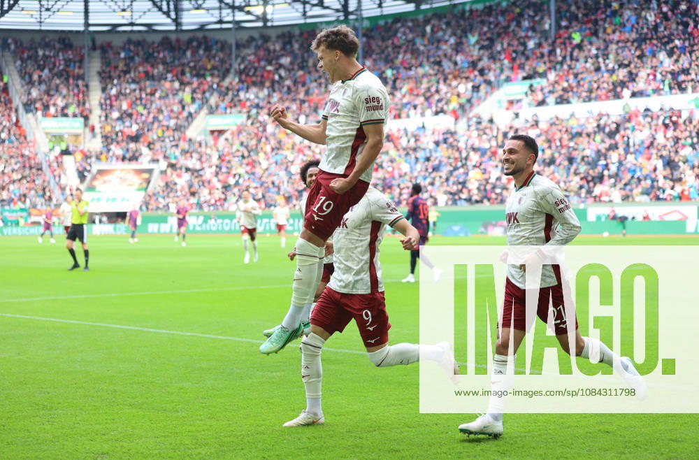 Soccer, Men s, 2026–2027 Season, FC Augsburg vs. FC Bayern Munich, Bundesliga, WWK Arena, 1–0 goal by Robin Fellhauer (FC Augsburg), goal celebration, celebratory jump. DFL and DFB regulations prohibit any use of photographs as image sequences and or quasi-video.