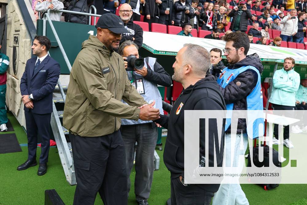 Head Coach Vincent Kompany of FC Bayern Munich greets Head Coach Manuel Baum of FC Augsburg; FC Augsburg vs. FC Bayern Munich, Soccer, 1. Bundesliga, Matchday 5, October 10, 2026. DFB and DFL regulations prohibit any use of photographs as image sequences and or quasi-video. Augsburg, Bayern, Germany