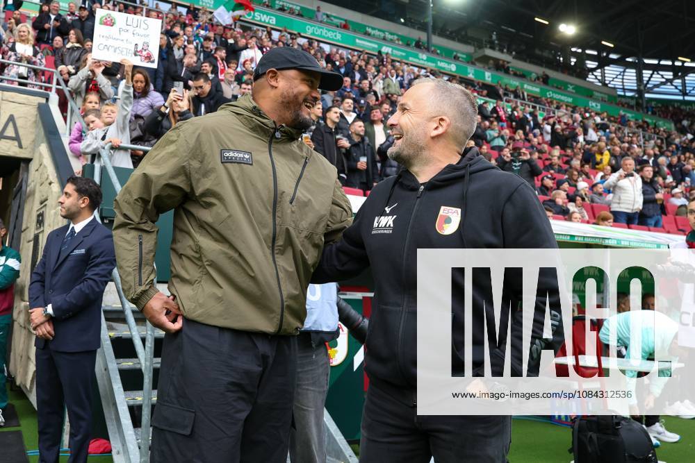 Head Coach Vincent Kompany of FC Bayern Munich greets Head Coach Manuel Baum of FC Augsburg; FC Augsburg vs. FC Bayern Munich, Soccer, 1. Bundesliga, Matchday 5, October 10, 2026. DFB and DFL regulations prohibit any use of photographs as image sequences and or quasi-video. Augsburg, Bayern, Germany