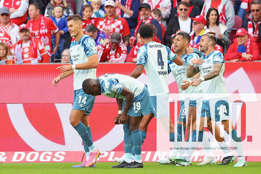 Mainz, Germany, October 10, 2026, Bundesliga 2026–2027, Matchday 5: FSV Mainz 05 vs. Bayer 04 Leverkusen. Pictured: Goal scorer Patrik Schick (B04), first from the left, celebrates his goal to make it 0–2. DFL regulations prohibit any use of photographs as image sequences and or quasi-video. Mewa Arena, Rhineland-Palatinate