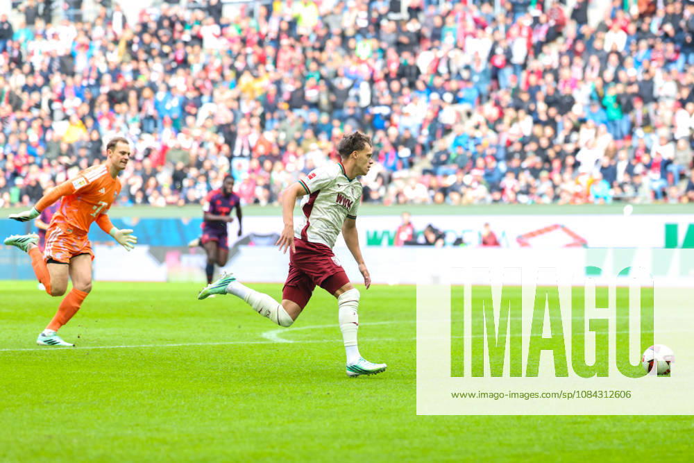 Just before the 10th minute, Robin Fellhauer (FC Augsburg, 19) dribbles past Manuel Neuer (FC Bayern Munich, 01), GER, FC Augsburg vs. FC Bayern Munich, Soccer, Bundesliga, Matchday 5, 2026–2027 season, October 10, 2026, DFL and DFB regulations prohibit any use of photographs as image sequences and or quasi-video, GER, FC Augsburg vs. FC Bayern Munich, Soccer, Bundesliga, Matchday 5, 2026–2027 season, October 10, 2026, Augsburg