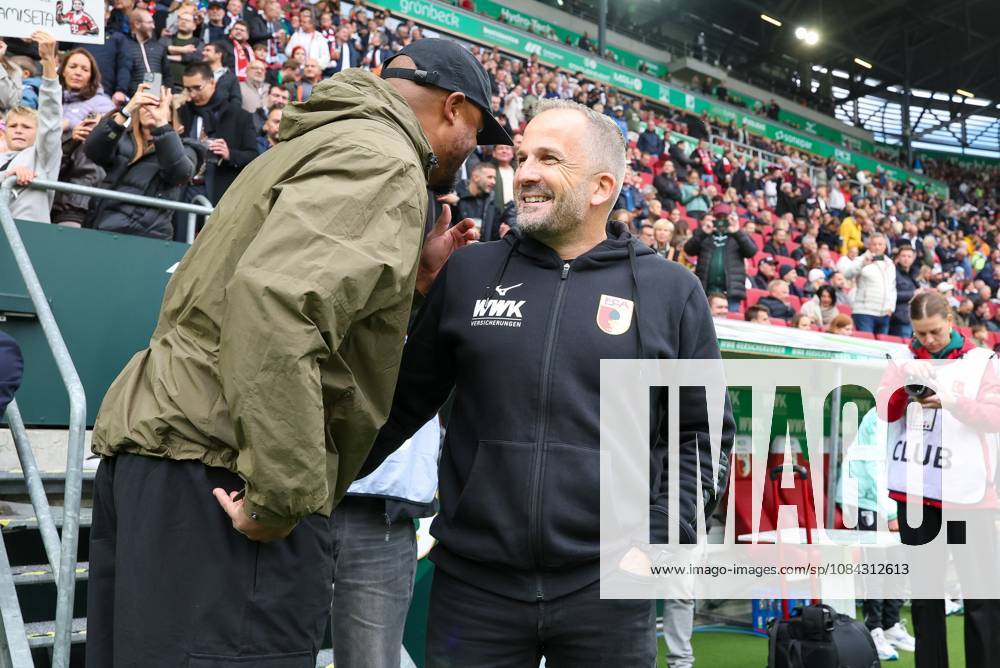 Head Coach Vincent Kompany of FC Bayern Munich greets Head Coach Manuel Baum of FC Augsburg; FC Augsburg vs. FC Bayern Munich, Soccer, 1. Bundesliga, Matchday 5, October 10, 2026. DFB and DFL regulations prohibit any use of photographs as image sequences and or quasi-video. Augsburg, Bayern, Germany