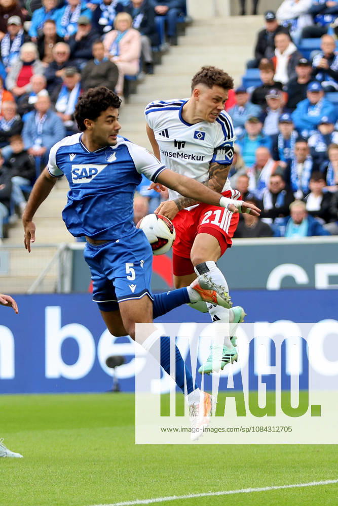 Soccer, Bundesliga 1, TSG 1899 Hoffenheim vs. Hamburger SV, tackle, duel, tackle, compete Ozan Kabak TSG 1899 Hoffenheim Nicolai Remberg Hamburger SV DFL DFB REGULATIONS PROHIBIT ANY USE OF PHOTOGRAPHS AS IMAGE SEQUENCES AND OR QUASI-VIDEO Sinsheim