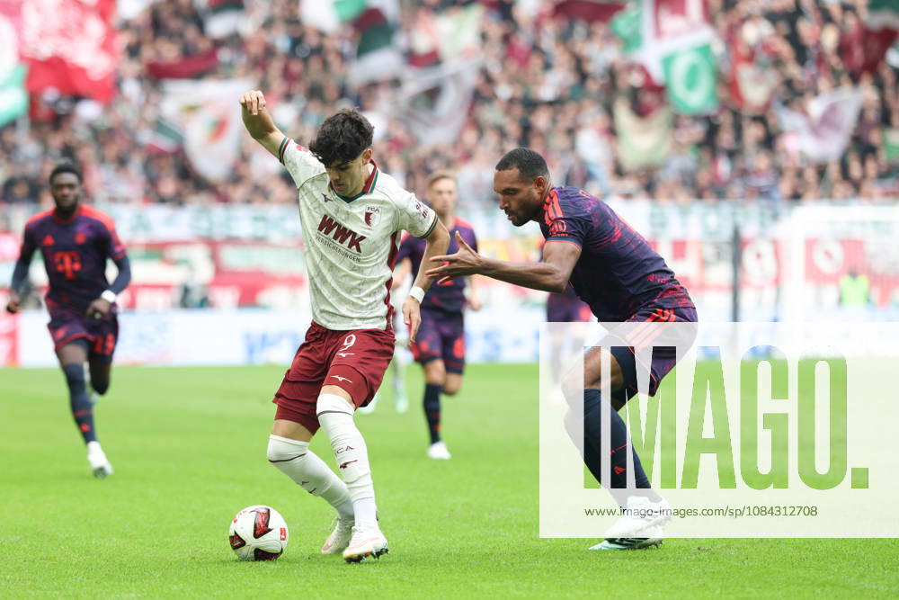 Rodrigo Ribeiro (FC Augsburg, No. 09) with the ball alongside Jonathan Tah (FC Bayern Munich, No. 04), GER, FC Augsburg vs. FC Bayern Munich, Soccer, Bundesliga, Matchday 5, 2026–2027 Season, October 10, 2026, DFL and DFB regulations prohibit any use of photographs as image sequences and or quasi-video, GER, FC Augsburg vs. FC Bayern Munich, soccer, Bundesliga, Matchday 5, 2026–2027 season, October 10, 2026, Augsburg