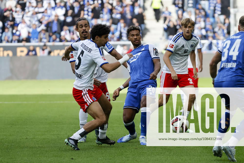 Yussuf Poulsen (Hamburger SV), 15, Martin Adeline (Hamburger SV), 05, and Bambase Conte (TSG Hoffenheim), 20, battling for the ball, Germany, soccer, Bundesliga 1, Matchday 5, 2026–2027, TSG Hoffenheim vs. Hamburger SV, October 10, 2026, Sinsheim SNP Arena, Germany
