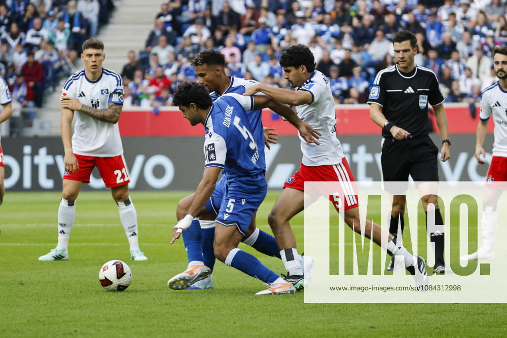 Ozan Kabak (TSG Hoffenheim), 05, Bambase Conte (TSG Hoffenheim), 20, and Martin Adeline (Hamburger SV), 05, battling for the ball, Germany, soccer, Bundesliga 1, Matchday 5, 2026–2027, TSG Hoffenheim vs. Hamburger SV, October 10, 2026, Sinsheim SNP Arena, Germany