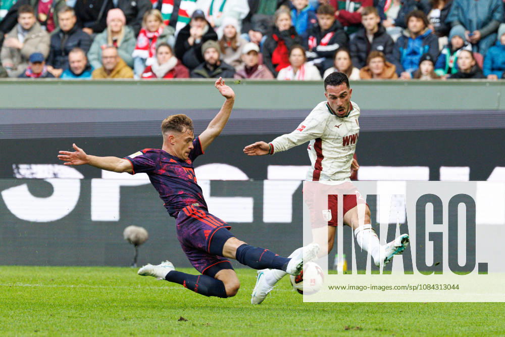 Arijon Ibrahimovic 21, FC Augsburg, and Joshua Kimmich 6, FC Bayern Munich, during the match between FC Augsburg and FC Bayern Munich, soccer, men s, Bundesliga, 2026–2027, Matchday 5 on October 10, 2026, in Augsburg, WWK ARENA. DFL and DFB regulations prohibit any use of photographs as image sequences and or quasi-video. Bayern, Germany