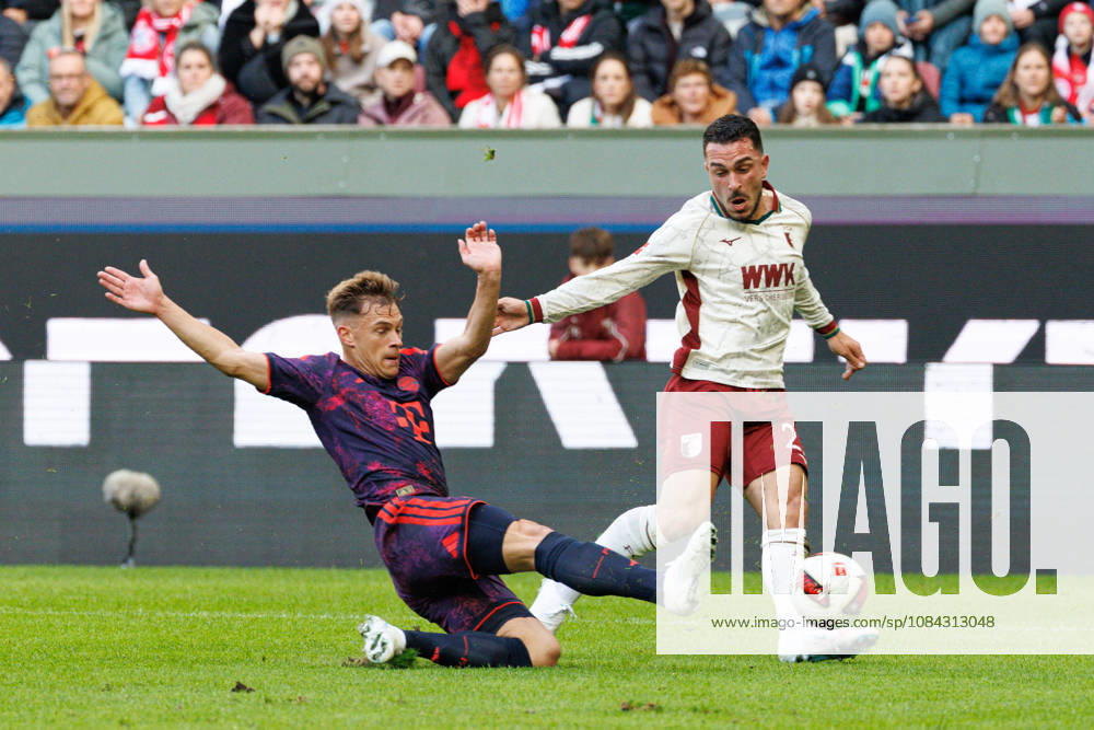Arijon Ibrahimovic 21, FC Augsburg, and Joshua Kimmich 6, FC Bayern Munich, during the match between FC Augsburg and FC Bayern Munich, soccer, men s, Bundesliga, 2026–2027, Matchday 5 on October 10, 2026, in Augsburg, WWK ARENA. DFL and DFB regulations prohibit any use of photographs as image sequences and or quasi-video. Bayern, Germany