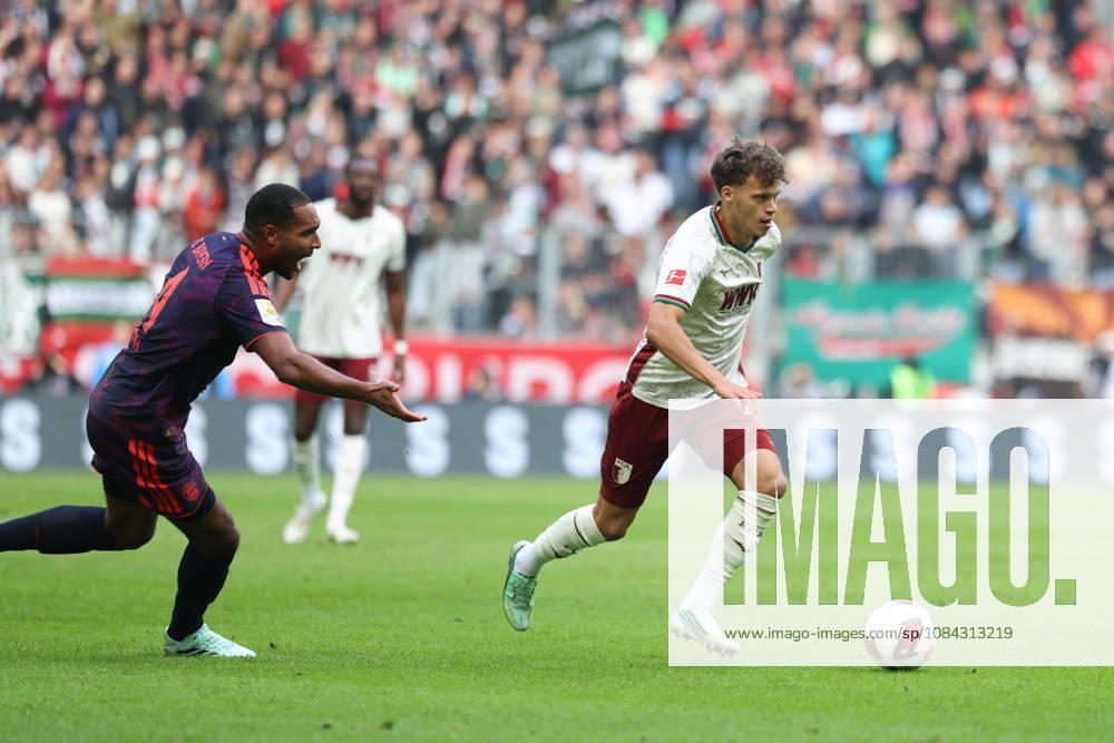 Robin Fellhauer, FC Augsburg, No. 19 with the ball, with Jonathan Tah, FC Bayern Munich, No. 04, GER, FC Augsburg vs. FC Bayern Munich, Soccer, Bundesliga, Matchday 5, 2026–2027 Season, October 10, 2026, DFL and DFB regulations prohibit any use of photographs as image sequences and or quasi-video, GER, FC Augsburg vs. FC Bayern Munich, soccer, Bundesliga, Matchday 5, 2026–2027 season, October 10, 2026, Augsburg