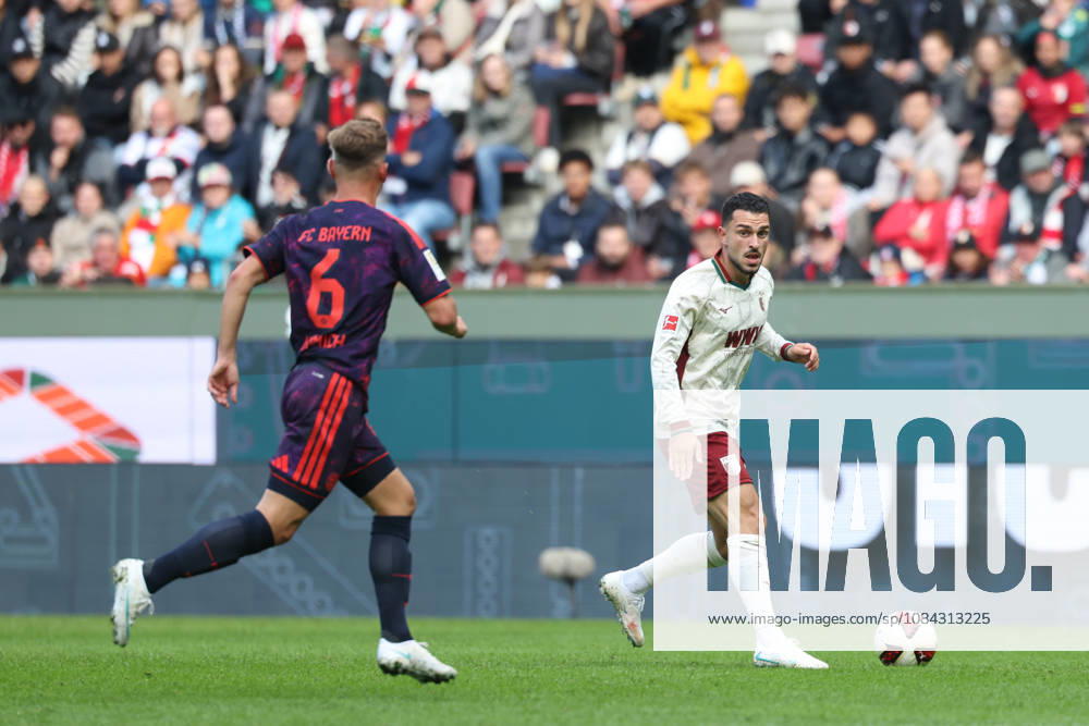Arijon Ibrahimovic, FC Augsburg, 21, with Joshua Kimmich, FC Bayern Munich, 06, GER, FC Augsburg vs. FC Bayern Munich, Soccer, Bundesliga, Matchday 5, 2026–2027 Season, October 10, 2026, DFL and DFB regulations prohibit any use of photographs as image sequences and or quasi-video, GER, FC Augsburg vs. FC Bayern Munich, soccer, Bundesliga, Matchday 5, 2026–2027 season, October 10, 2026, Augsburg