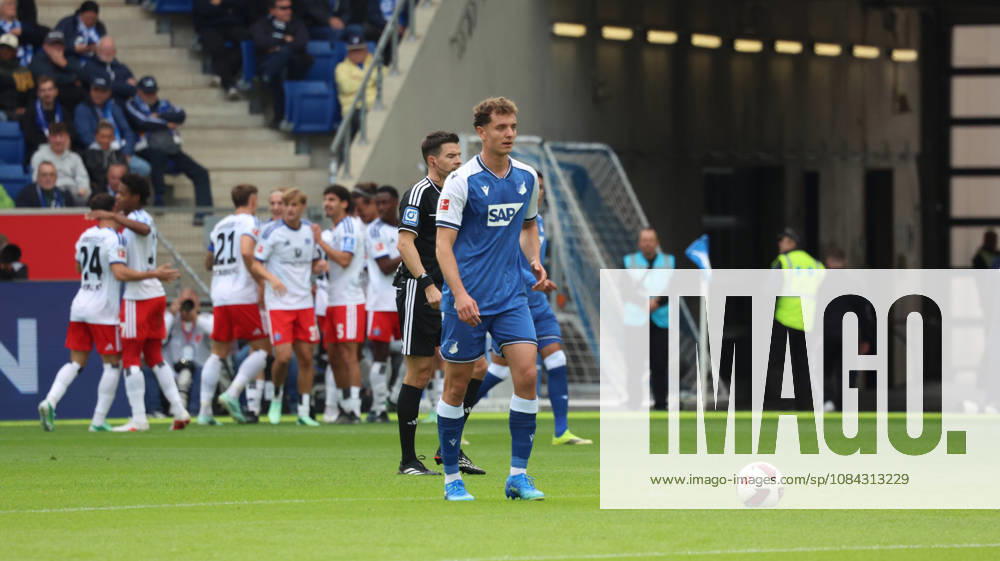Soccer, Bundesliga 1, TSG 1899 Hoffenheim vs. Hamburger SV: Goal celebration after Yussuf Poulsen scores the 0–1 goal for Hamburger SV; Fisnik Asllani of TSG 1899 Hoffenheim looks disappointed, dejected, looks disappointed, dejected, Sinsheim