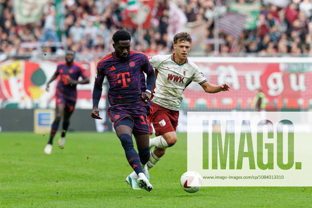 Alphonso Davies, 19, FC Bayern Munich, and Robin Fellhauer, 19, FC Augsburg, during the match between FC Augsburg and FC Bayern Munich, soccer, men s, Bundesliga, 2026–2027, Matchday 5 on October 10, 2026, in Augsburg, WWK ARENA. DFL and DFB regulations prohibit any use of photographs as image sequences and or quasi-video. Bayern, Germany