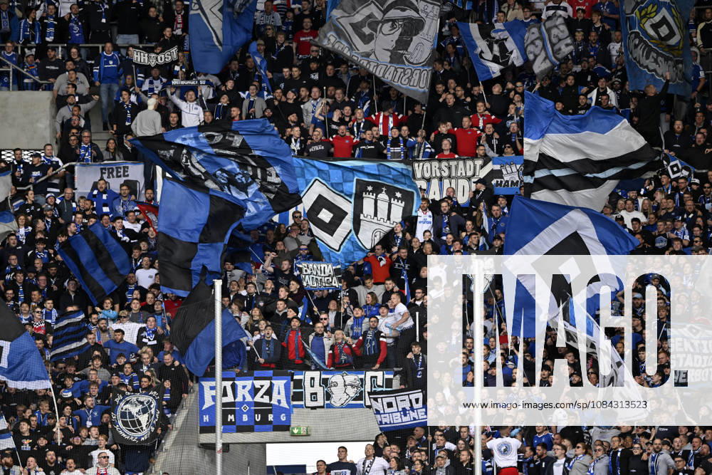 Fan section, fans, fan curve, flags, banners, atmosphere, atmospheric HSV Hamburger SV TSG 1899 Hoffenheim vs. Hamburger SV HSV October 10, 2026 DFL regulations prohibit any use of photographs as image sequences and or quasi-video TSG 1899 Hoffenheim vs. Hamburger SV (HSV)