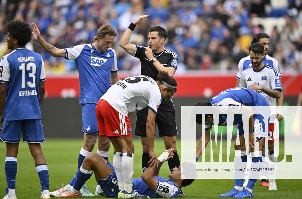 Injury: Ozan Kabak, TSG 1899 Hoffenheim 05; Referee: Harm Osmers calls over a coach; TSG 1899 Hoffenheim vs. Hamburger SV (HSV) 10, 10, 2026; DFL regulations prohibit any use of photosOGRAPHS AS IMAGE SEQUENCES AND OR QUASI-VIDEO TSG 1899 Hoffenheim vs. Hamburger SV (HSV)