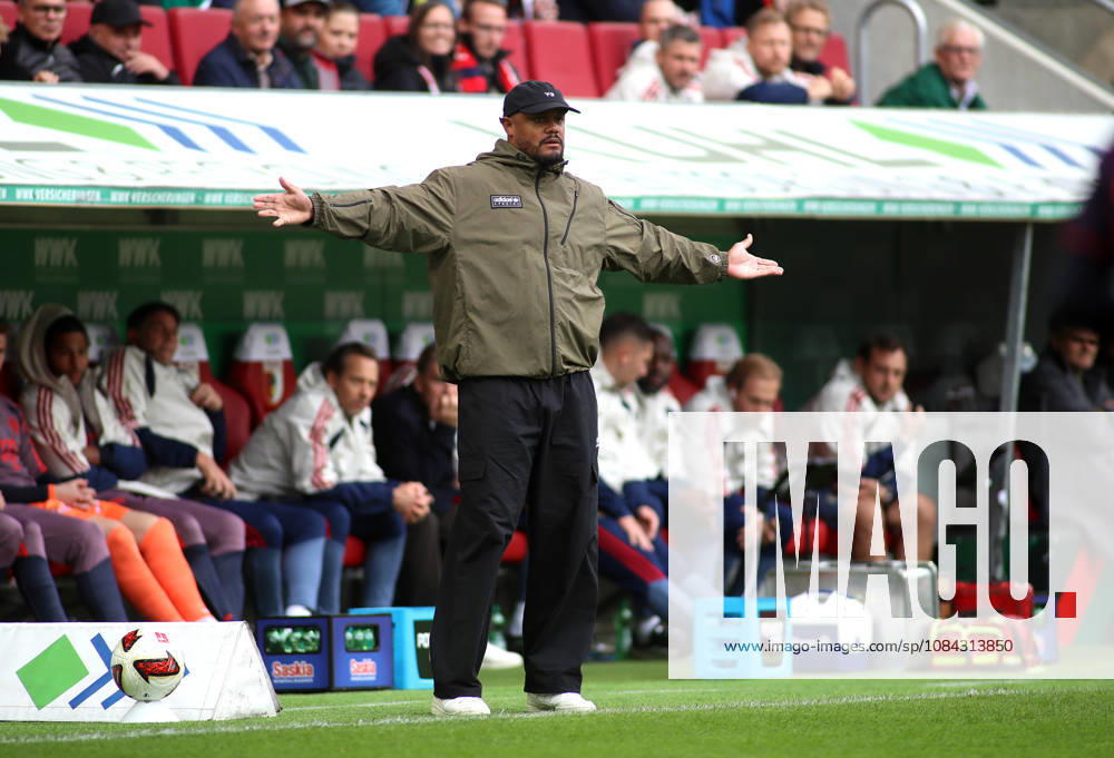 Soccer, Men s, 2026–2027 Season, FC Augsburg vs. FC Bayern Munich, Bundesliga, WWK Arena: Vincent Kompany, coach of FC Bayern Munich, stretches both arms out. DFL and DFB regulations prohibit any use of photographs as image sequences and or quasi-video.