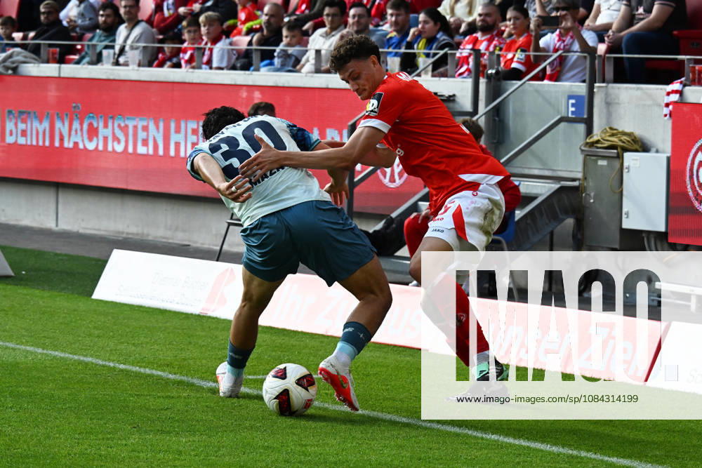 Soccer, Bundesliga 1, FSV Mainz 05 vs. Bayer 04 Leverkusen, Ibrahim Maza (Bayer 04 Leverkusen) and Eric Martel (FSV Mainz 05), tackle, action, battle for the ball Mainz