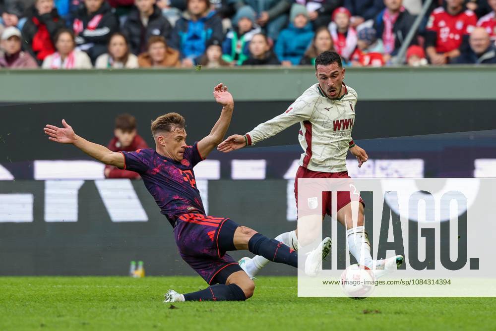 One-on-one, action, featuring Joshua Kimmich 6 (FC Bayern Munich) and Arijon Ibrahimovic 21 (FC Augsburg), FC Augsburg vs. FC Bayern Munich, soccer, Bundesliga 1, Matchday 5, October 10, 2026. DFB and DFL regulations prohibit any use of photographs as image sequences and or quasi-video. Augsburg, Bayern, Germany