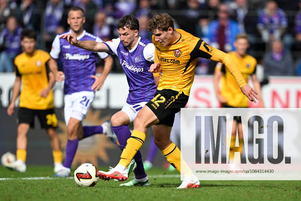 2. Bundesliga, Matchday 26, VfL Osnabrück vs. Dynamo Dresden on October 10, 2026, at Bremer Brücke in Osnabrück; Robin Meißner (Osnabrück) in a tackle against Friedrich Müller (Dresden) MT