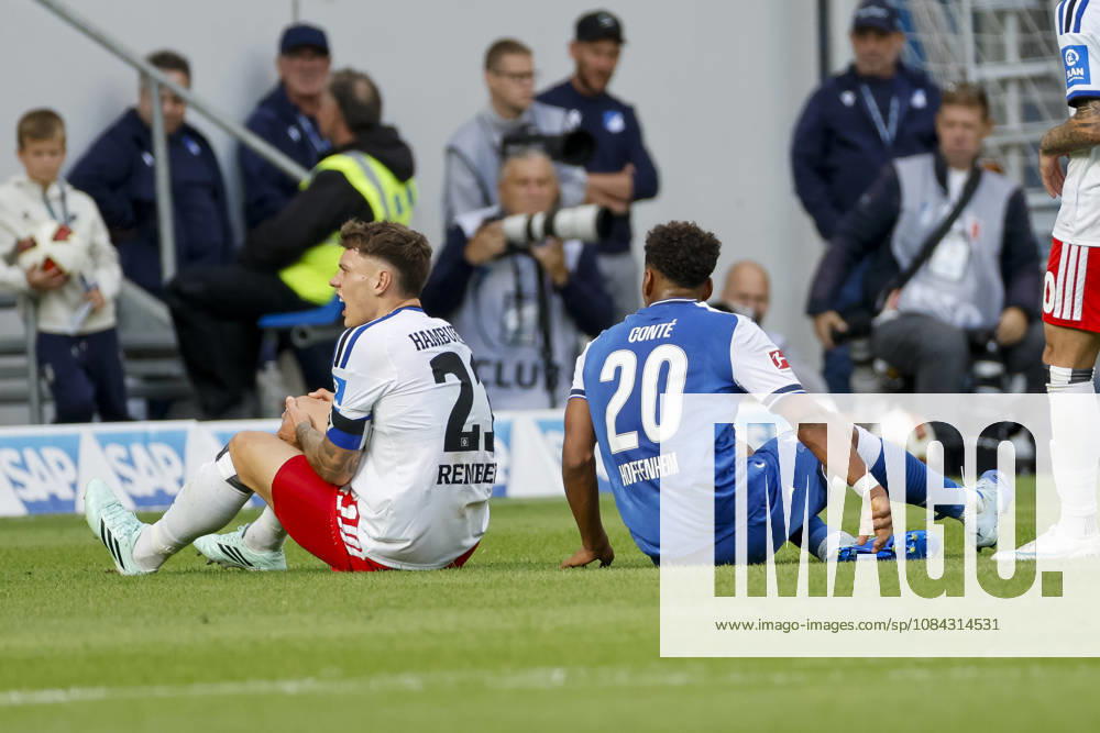 Nicolai Remberg of Hamburger SV, 21, and Bambase Conte of TSG Hoffenheim, 20, on the ground, Germany, soccer, Bundesliga 1, Matchday 5, 2026–2027, TSG Hoffenheim vs. Hamburger SV, October 10, 2026, Sinsheim SNP Arena, Germany