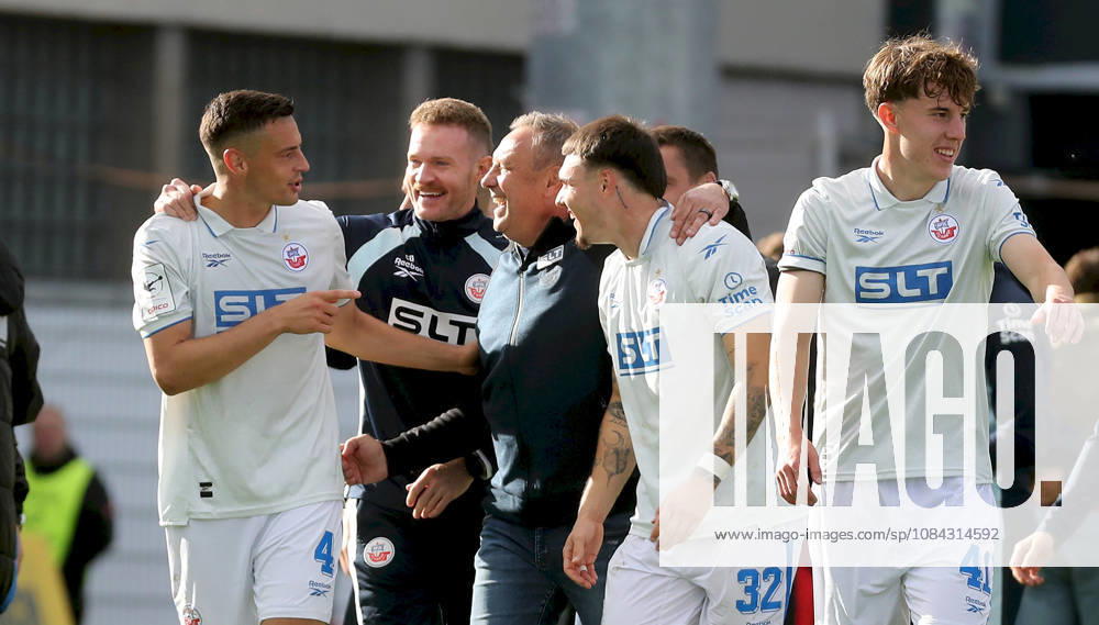 Men s, Soccer, 2026–2027 Season, 3rd Division, Matchday 8: FC Würzburger Kickers vs. FC Hansa Rostock; from left: Kenan Fatkic (FC Hansa Rostock), Coach Andre Breitenreiter (FC Hansa Rostock), Niklas Koelle, FC Hansa Rostock; Yannick Michaelis, FC Hansa Rostock, celebrating after the final whistle in Würzburg, AKON ARENA, Bavaria, Germany