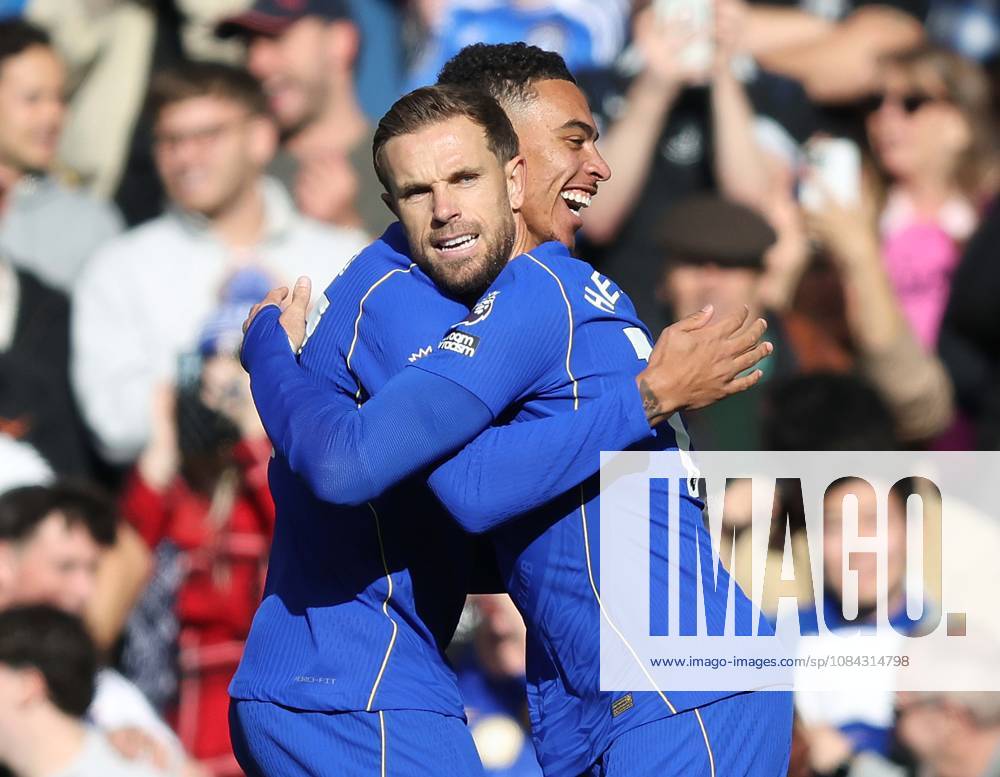 Premier League - Chelsea v AFC Bournemouth LONDON, ENGLAND, OCTOBER 10: GOAL 1-0, Jordan Henderson of Chelsea goal celebration with Morgan Rogers of Chelsea after scoring a goal to make the score 1-0 during The Premier League match between Chelsea v AFC Bournemouth at Stamford Bridge Stadium, London, England, on October 10. (Photo by Daniel Weir) London Stamford Bridge Stadium England
