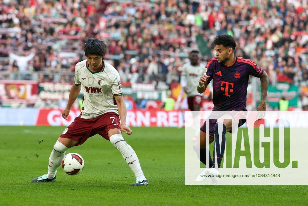 One-on-one, action, featuring Young Woo Seol (7, FC Augsburg) and Luis Diaz (14, FC Bayern Munich), FC Augsburg vs. FC Bayern Munich, soccer, Bundesliga 1, Matchday 5, October 10, 2026. DFB and DFL regulations prohibit any use of photographs as image sequences and or quasi-video. Augsburg, Bayern, Germany