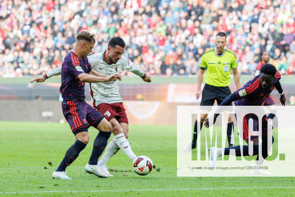 Arijon Ibrahimovic 21, FC Augsburg, and Joshua Kimmich 6, FC Bayern Munich, during the match between FC Augsburg and FC Bayern Munich, soccer, men s, Bundesliga, 2026–2027, Matchday 5 on October 10, 2026, in Augsburg, WWK ARENA. DFL and DFB regulations prohibit any use of photographs as image sequences and or quasi-video. Bavaria, Germany