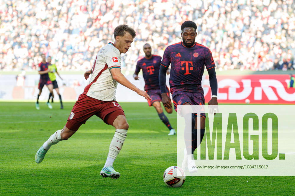Robin Fellhauer, 19, FC Augsburg, and Alphonso Davies, 19, FC Bayern Munich, during the match between FC Augsburg and FC Bayern Munich, soccer, men s, Bundesliga, 2026–2027, Matchday 5 on October 10, 2026, in Augsburg, WWK ARENA. DFL and DFB regulations prohibit any use of photographs as image sequences and or quasi-video. Bavaria, Germany