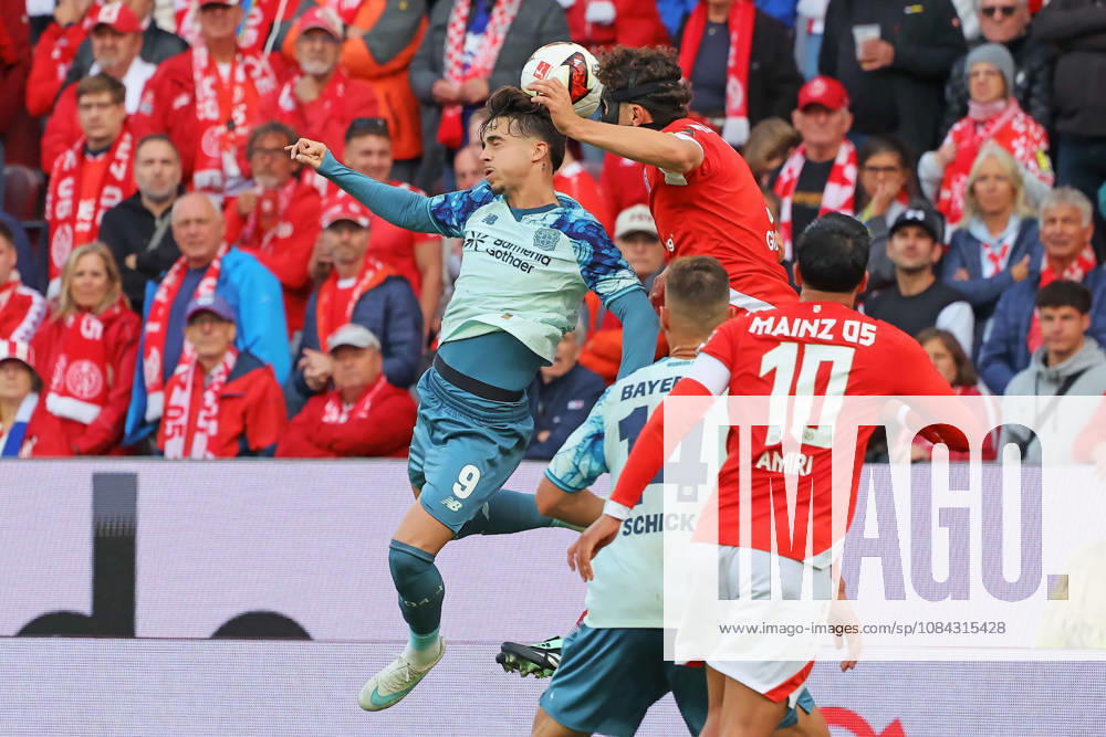 Mainz, Germany October 10, 2026 Bundesliga 2026–2027 Matchday 5: FSV Mainz 05 vs. Bayer 04 Leverkusen Pictured, from left, in a tackle: Afonso Moreira (B04) against Fabio Gruber (M05). DFL regulations prohibit any use of photographs as image sequences and or quasi-video. Mewa Arena, Rhineland-Palatinate