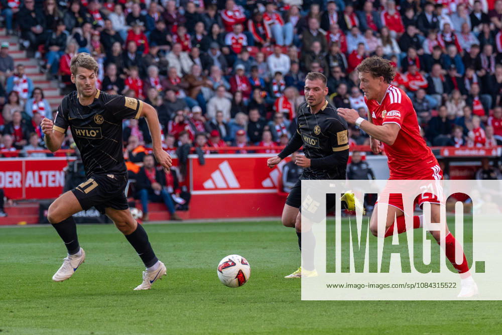 German Soccer 1st Bundesliga, Matchday 5, 2026–2027, 1. FC Union Berlin vs. SV Elversberg on October 10, 2026, at the Stadion An der Alten Försterei in Berlin; Tim Skarke of 1. FC Union Berlin, No. 21, in a tackle with Maximilian Rohr of SV Elversberg, No. 31