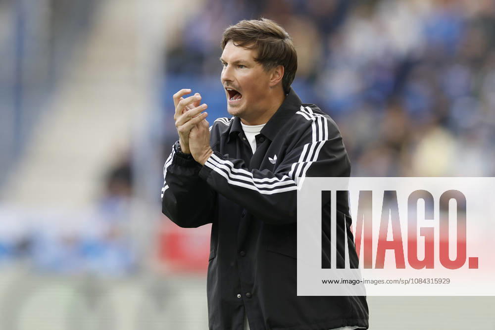 Coach Merlin Polzin of HSV in action during the Bundesliga match between TSG 1899 Hoffenheim and Hamburger SV at the PreZero Arena in Sinsheim, Germany, on October 10, 2026, Sinsheim, Germany, on October 10, 2026. DFB and DFL regulations prohibit any use of photographs as image sequences and or quasi-video,