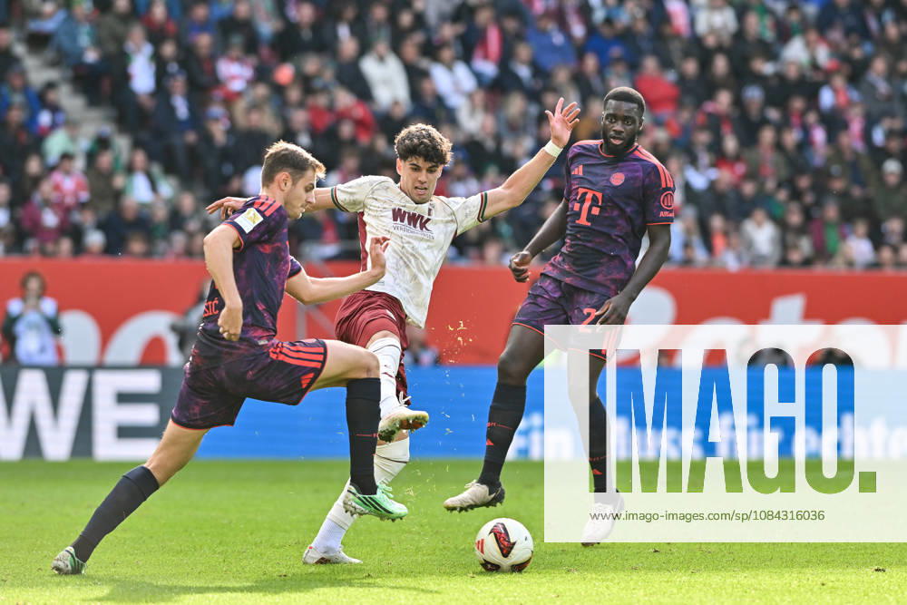AUGSBURG, GERMANY; 10. OCTOBER: tackle between Josip STANISIC (FC Bayern Munich 44) and Rodrigo Duarte RIBEIRO (FC Augsburg 9) during the Bundesliga Match between FC Augsburg vs. FC Bayern Munich at Matchday 5 at WWK-Arena DFL REGULATIONS PROHIBIT ANY USE OF PHOTOGRAPHS AS IMAGE SEQUENCES AND OR QUASI-VIDEO Dayot UPAMECANO (FC Bayern Munich 2)