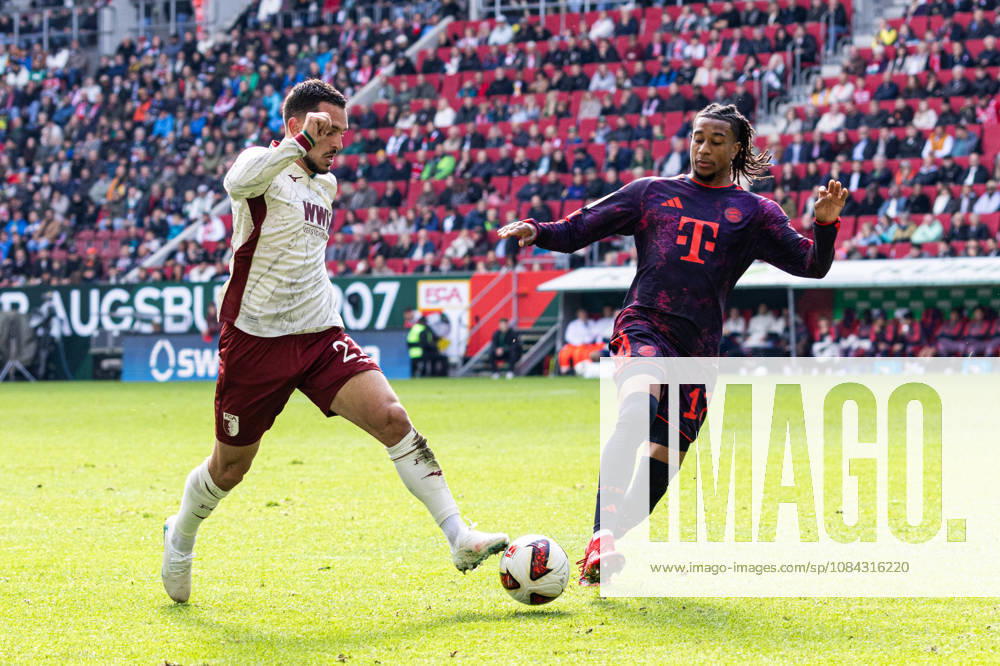 Germany: FC Augsburg vs. FC Bayern Munich, Bundesliga 1, Matchday 5, 2026–27 Season, WWK Arena, Augsburg; Michael Olise, FC Bayern Munich, 17; Arijon Ibrahimovic, FC Augsburg, 21; Augsburg, WWK Arena, Bayern, Germany