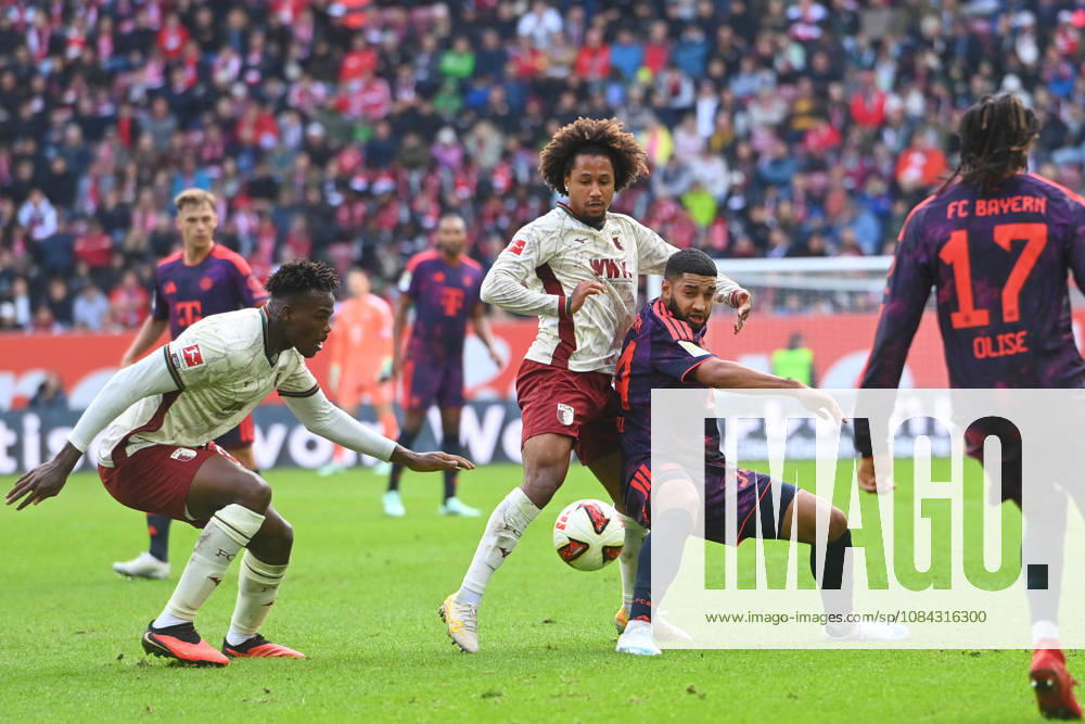 Ismael SAIBARI, Bayern Munich; action, tackle against Han Noah MASENGO, FC Augsburg, and Li Seong Hoon CHEON, FC Augsburg; soccer, Bundesliga Season 2026–2027, Matchday 5, Matchday 05, FC Augsburg vs. FC Bayern Munich on October 10, 2026, WWK ARENA