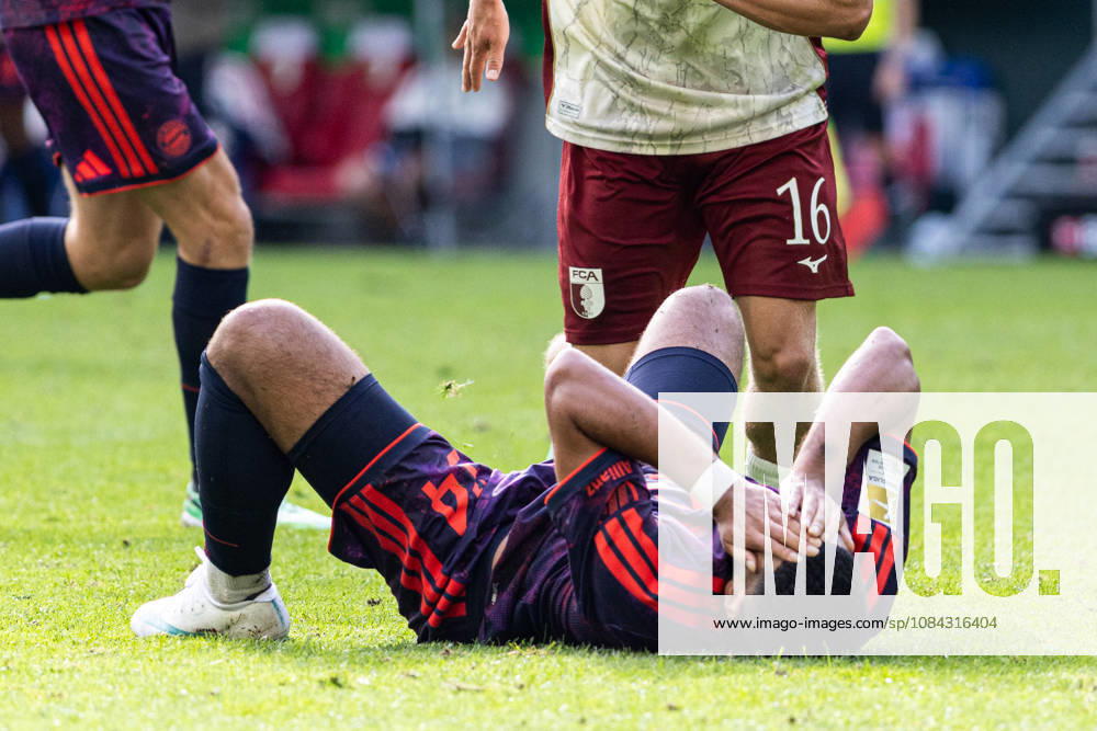 Germany: FC Augsburg vs. FC Bayern Munich, Bundesliga 1, Matchday 5, 2026–27 Season, WWK Arena, Augsburg; Ismael Saibari of FC Bayern Munich, 34, lies on the ground in pain; Augsburg, WWK Arena, Bayern, Germany