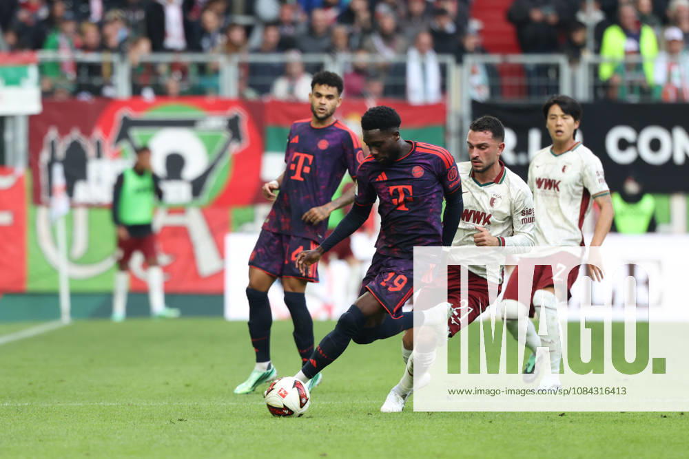 Alphonso Davies, FC Bayern Munich, 19, with Arijon Ibrahimovic, FC Augsburg, 21, GER, FC Augsburg vs. FC Bayern Munich, Soccer, Bundesliga, Matchday 5, 2026–2027 Season, October 10, 2026, DFL and DFB regulations prohibit any use of photographs as image sequences and or quasi-video, GER, FC Augsburg vs. FC Bayern Munich, soccer, Bundesliga, Matchday 5, 2026–2027 season, October 10, 2026, Augsburg