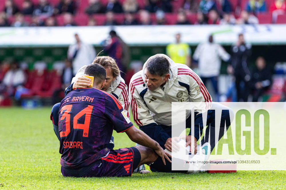 Germany: FC Augsburg vs. FC Bayern Munich, Bundesliga 1, Matchday 5, 2026–27 Season, WWK Arena, Augsburg; Ismael Saibari, FC Bayern Munich, 34, lying on the ground in pain, Augsburg WWK Arena, Bayern, Germany