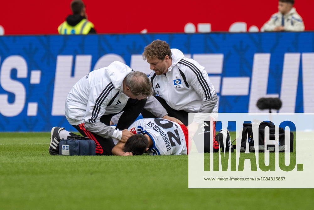 Fabio Vieira of Hamburger SV is lying on the ground injured and is receiving treatment Germany, Sinsheim, October 10, 2026, Soccer, Bundesliga: TSG 1899 Hoffenheim vs. Hamburger SV, 2026–2027 season, Matchday 5, SNP Arena. DFL and DFB regulations prohibit any use of photographs as image sequences and or quasi-video.