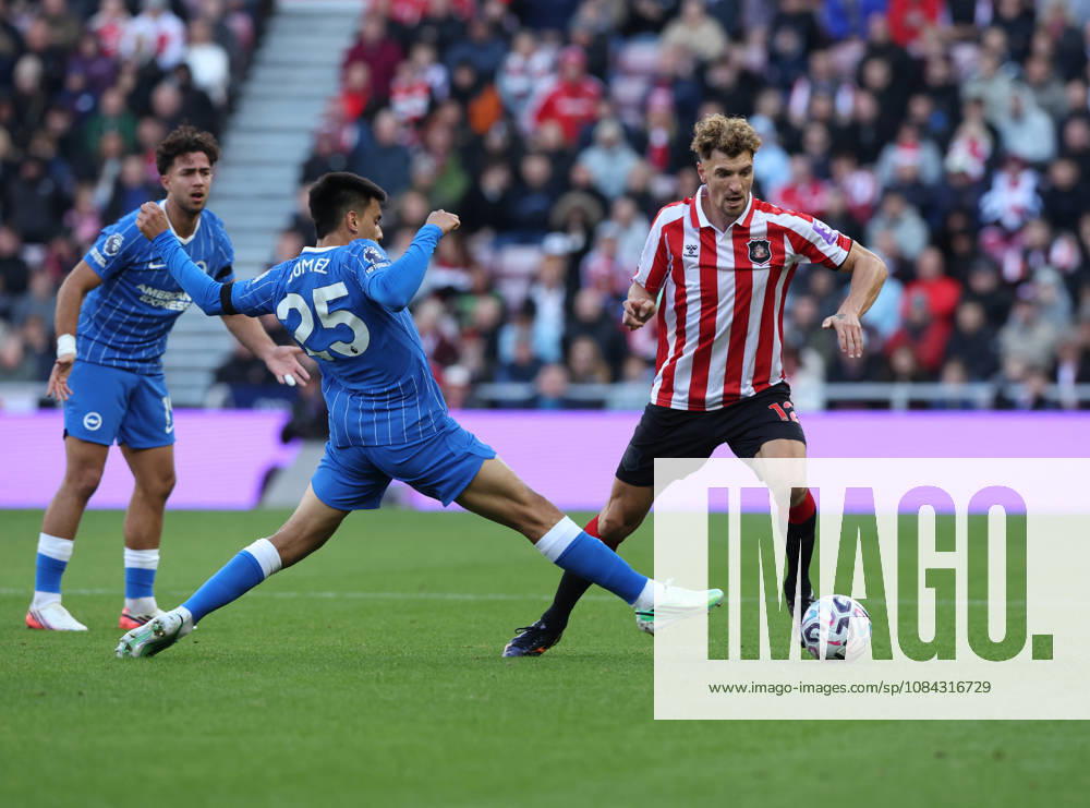 Sunderland, England, 10th October 2026. Thomas Meunier (R) of Sunderland in action with Diego Gomez of Brighton during the Sunderland vs Brighton and Hove Albion Premier League match at the Stadium Of Light, Sunderland. Picture credit should read: Nigel Roddis Sportimage . SPI_011_NR_SUND_BRIG SPI-5059-0011