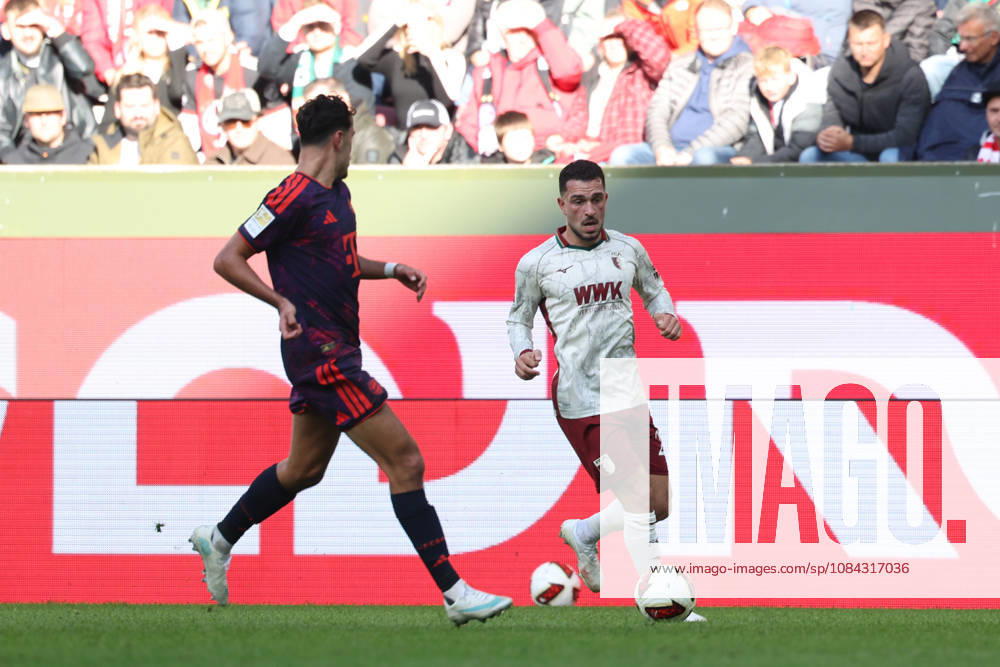 Arijon Ibrahimovic (FC Augsburg), 21, with Aleksandar Pavlovic (FC Bayern Munich), 45, GER, FC Augsburg vs. FC Bayern Munich, Soccer, Bundesliga, Matchday 5, 2026–2027 Season, October 10, 2026, DFL and DFB regulations prohibit any use of photographs as image sequences and or quasi-video, GER, FC Augsburg vs. FC Bayern Munich, soccer, Bundesliga, Matchday 5, 2026–2027 season, October 10, 2026, Augsburg
