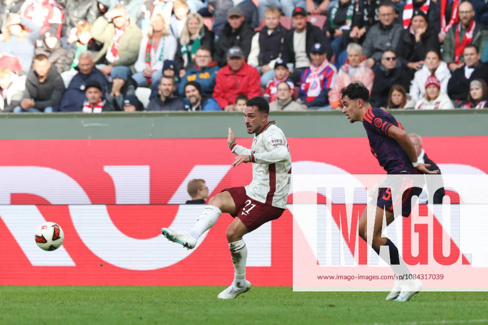 Arijon Ibrahimovic (FC Augsburg), 21, with Aleksandar Pavlovic (FC Bayern Munich), 45, GER, FC Augsburg vs. FC Bayern Munich, Soccer, Bundesliga, Matchday 5, 2026–2027 Season, October 10, 2026, DFL and DFB regulations prohibit any use of photographs as image sequences and or quasi-video, GER, FC Augsburg vs. FC Bayern Munich, soccer, Bundesliga, Matchday 5, 2026–2027 season, October 10, 2026, Augsburg
