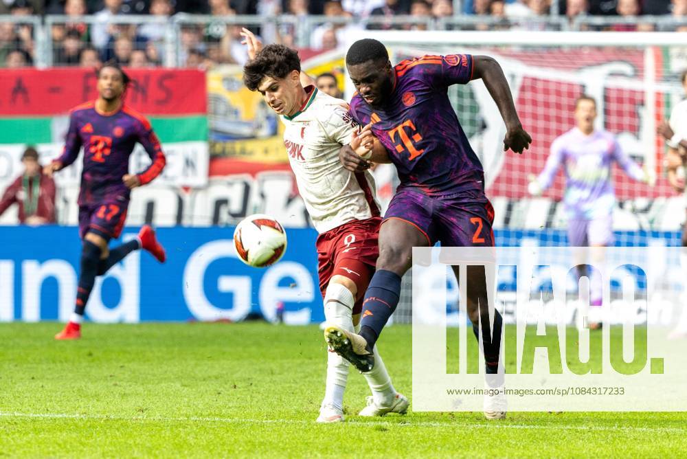 Rodrigo Ribeiro (FC Augsburg) and Dayot Upamecano (FC Bayern Munich) in a tackle, FC Augsburg vs. FC Bayern Munich, Bundesliga, Soccer, Bundesliga 1, Matchday 5, October 10, 2026. DFL regulations prohibit any use of photographs as image sequences and or quasi-video.
