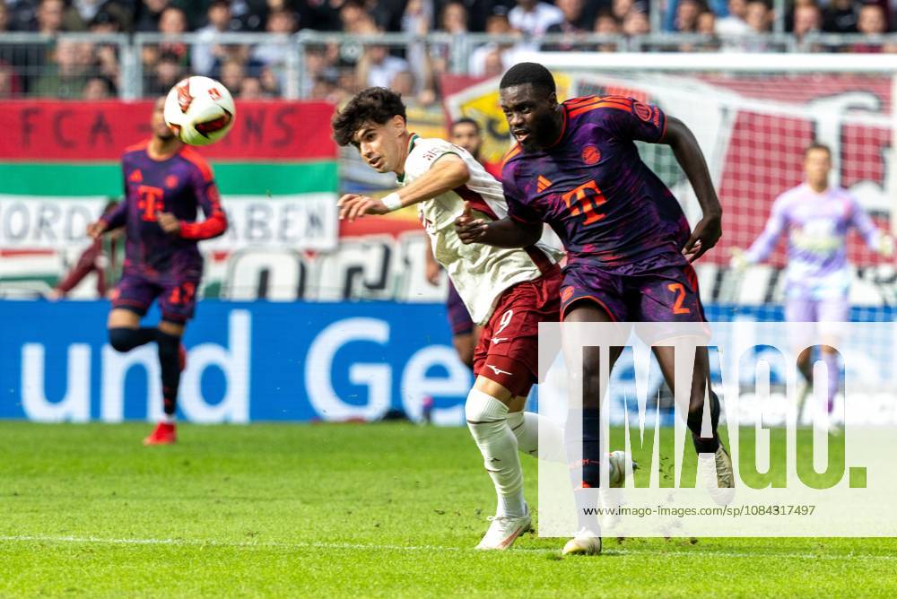 Rodrigo Ribeiro (FC Augsburg) and Dayot Upamecano (FC Bayern Munich) in a tackle, FC Augsburg vs. FC Bayern Munich, Bundesliga, Soccer, Bundesliga 1, Matchday 5, October 10, 2026. DFL regulations prohibit any use of photographs as image sequences and or quasi-video.