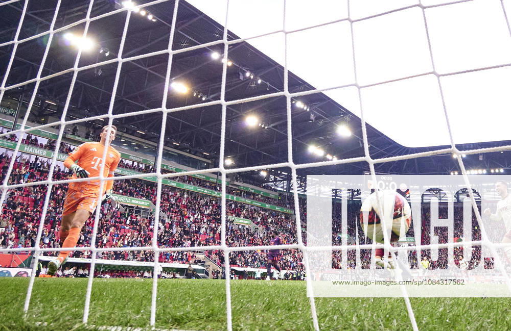 Robin Fellhauer of Augsburg scoring the 1-0 goal after 8,4 seconds and after a big mistake of Manuel Neuer, goalkeeper of FC Bayern München , Head coach Vincent Kompany of Bayern München disappointed in the background during the match FC AUGSBURG - FC BAYERN MÜNCHEN on October 10, 2026 at WWK Arena Augsburg, Germany. Season 2026 2027, 1.Bundesliga, FCB,