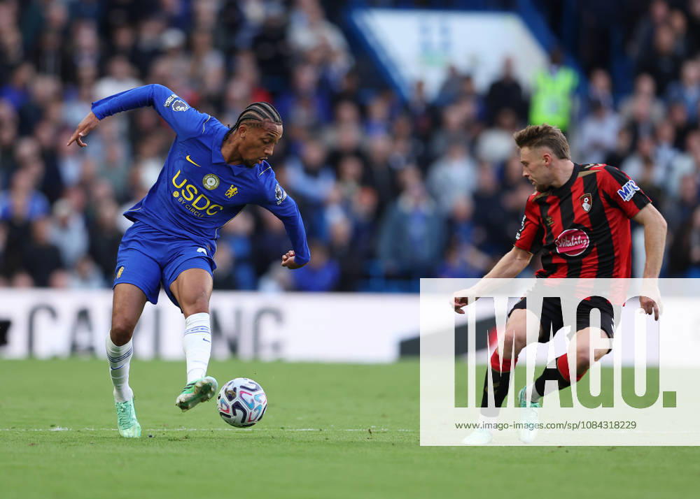 10th October 2026; Stamford Bridge, London, England; Premier League Football, Chelsea versus Bournemouth; Joao Pedro of Chelsea under pressure from Adrien Truffert of AFC Bournemouth JohnxPatrickxFletcher