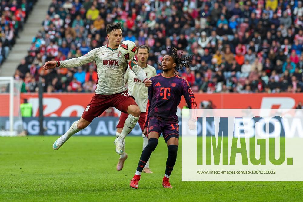 One-on-one, action, featuring Fabian Rieder 32 (FC Augsburg) and Michael Olise 17 (FC Bayern Munich), FC Augsburg vs. FC Bayern Munich, soccer, Bundesliga 1, Matchday 5, October 10, 2026. DFB and DFL regulations prohibit any use of photographs as image sequences and or quasi-video. Augsburg, Bayern, Germany