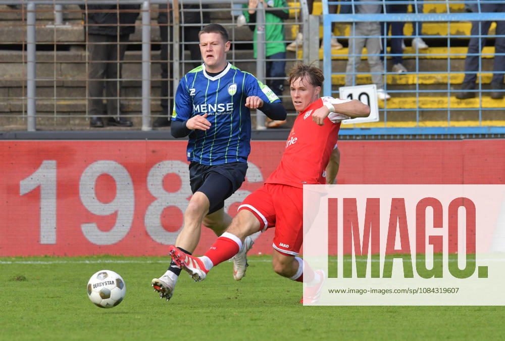 GER, Soccer, Regionalliga West, 2026–2027 Season, Matchday 12, Ohlendorf Stadium in Heidewald, Gütersloh FC vs. SF Siegen 0–5, Justin Lukas (FC Gütersloh, left) vs. Konstantin Gerhardt (SF Siegen), action, duel, tackle