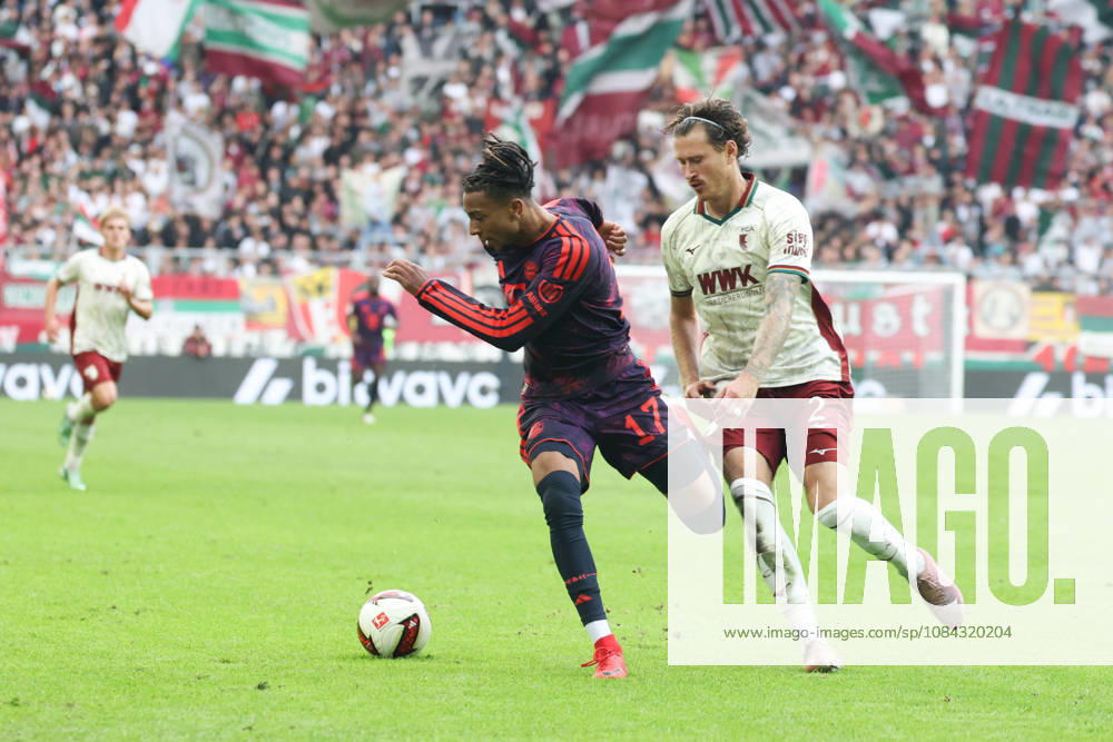 Michael Olise, FC Bayern Munich, 17, with Calvin Brackelmann, FC Augsburg, 02, GER, FC Augsburg vs. FC Bayern Munich, Soccer, Bundesliga, Matchday 5, 2026–2027 Season, October 10, 2026, DFL and DFB regulations prohibit any use of photographs as image sequences and or quasi-video, GER, FC Augsburg vs. FC Bayern Munich, Soccer, Bundesliga, Matchday 5, 2026–2027 season, October 10, 2026, Augsburg