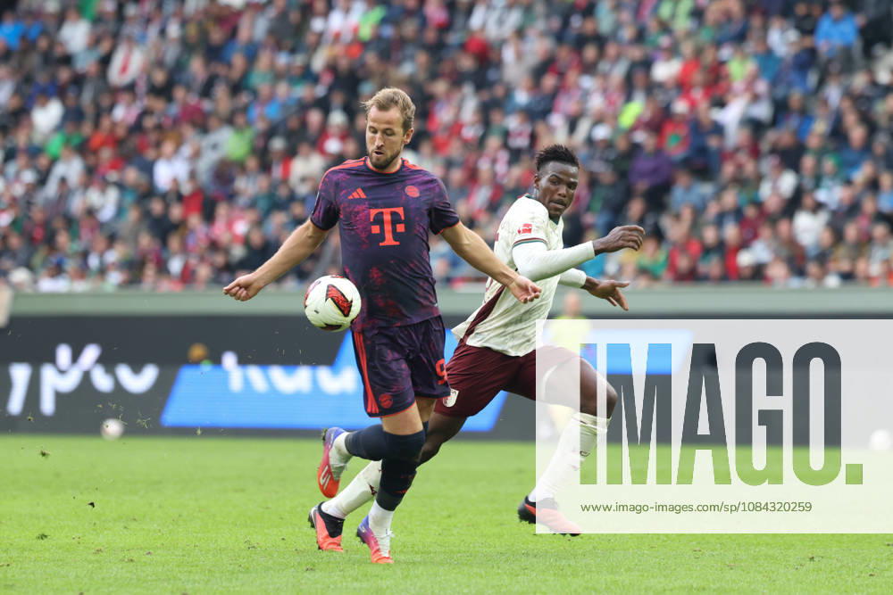 Harry Kane, FC Bayern Munich, 09, with Abdulai Bah, FC Augsburg, 35, GER, FC Augsburg vs. FC Bayern Munich, Soccer, Bundesliga, Matchday 5, 2026–2027 Season, October 10, 2026, DFL and DFB regulations prohibit any use of photographs as image sequences and or quasi-video, GER, FC Augsburg vs. FC Bayern Munich, Soccer, Bundesliga, Matchday 5, 2026–2027 season, October 10, 2026, Augsburg