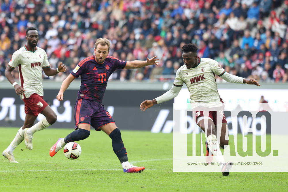 Harry Kane, FC Bayern Munich, 09, with Abdulai Bah, FC Augsburg, 35, GER, FC Augsburg vs. FC Bayern Munich, Soccer, Bundesliga, Matchday 5, 2026–2027 Season, October 10, 2026, DFL and DFB regulations prohibit any use of photographs as image sequences and or quasi-video, GER, FC Augsburg vs. FC Bayern Munich, Soccer, Bundesliga, Matchday 5, 2026–2027 season, October 10, 2026, Augsburg
